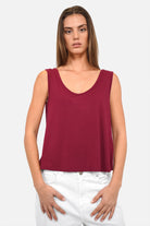 JOVRA Top in flowing viscose jersey with deep round neckline and relaxed fit on model