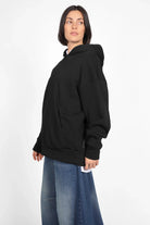 Schwarzer LAURA.K Oversize Hoodie aus weicher Baumwolle mit großer Kapuze und lässigem Schnitt