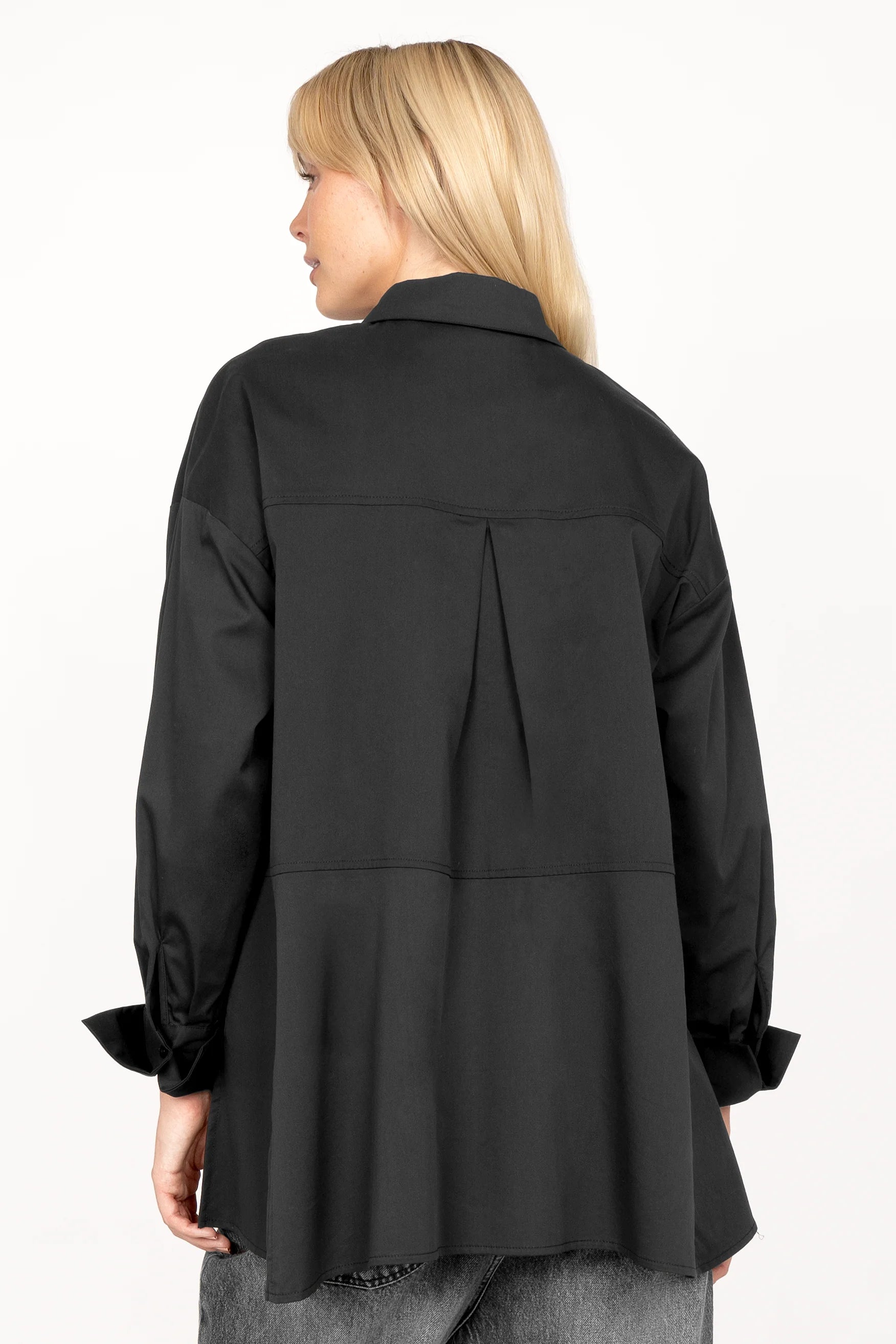 Back view of LEA.K Loose Fit black cotton popeline blouse with trapezoidal hem and pleated back detail