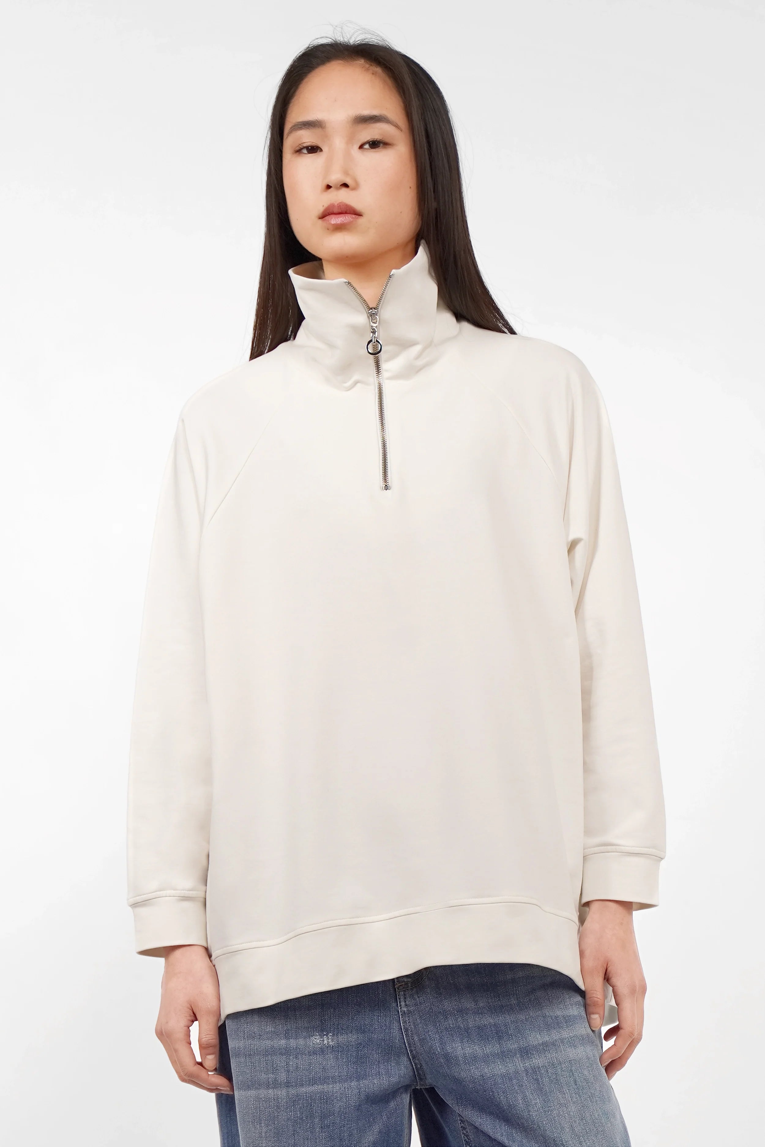 Damen Troyer-Oversize Sweater mit Halber Reißverschluss, Stehkragen und Raglanärmeln in cremefarbenem Design