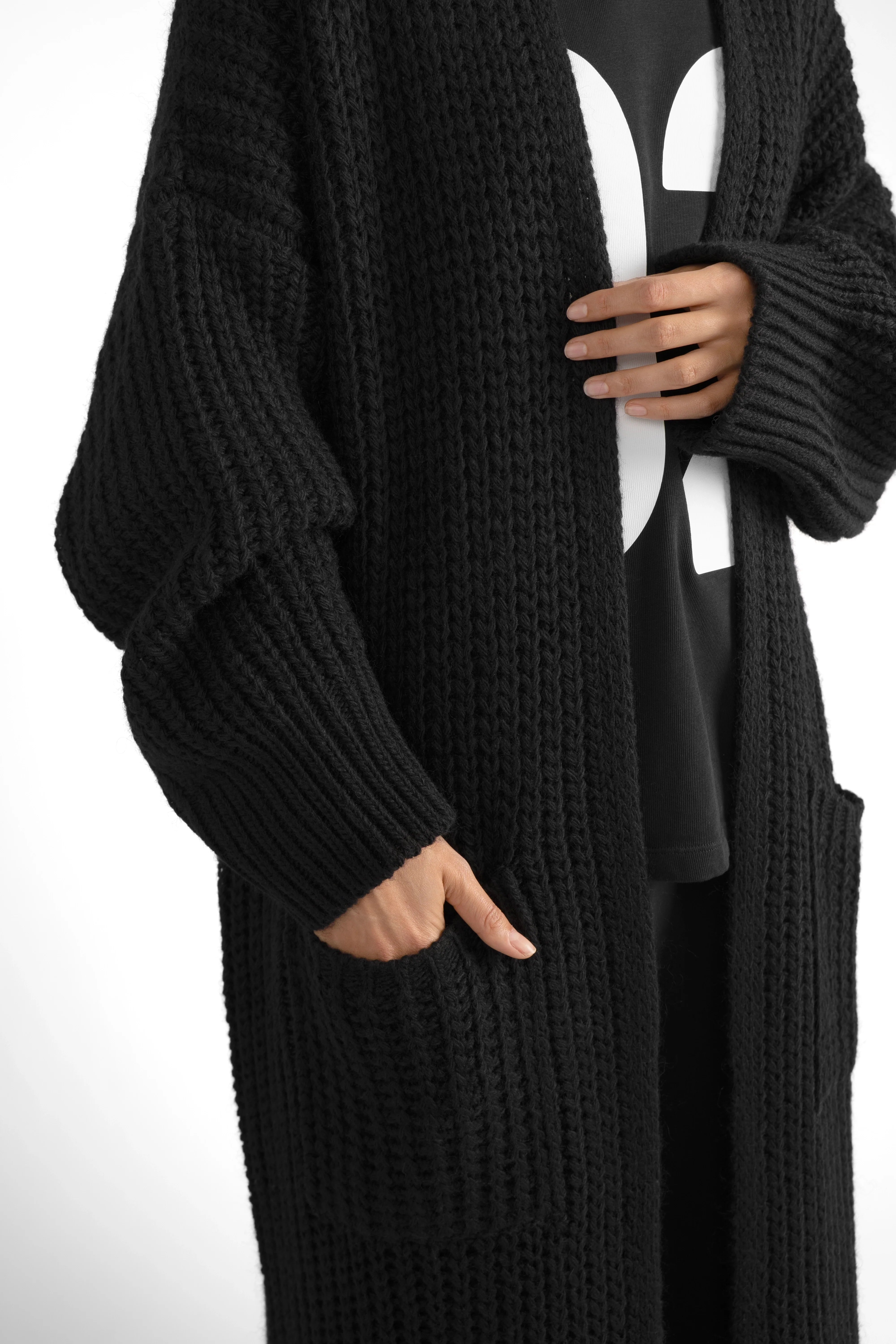 Black LOLA Strickcardigan oversized knit with relaxed fit and front pockets