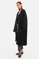 Oversized Strickcardigan offen mit überschnittenen Schultern und aufgesetzten Taschen