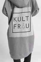 Grey oversized Longzip-Hoodie with two-way zipper, hood, side pockets, and stitched logo patch on back