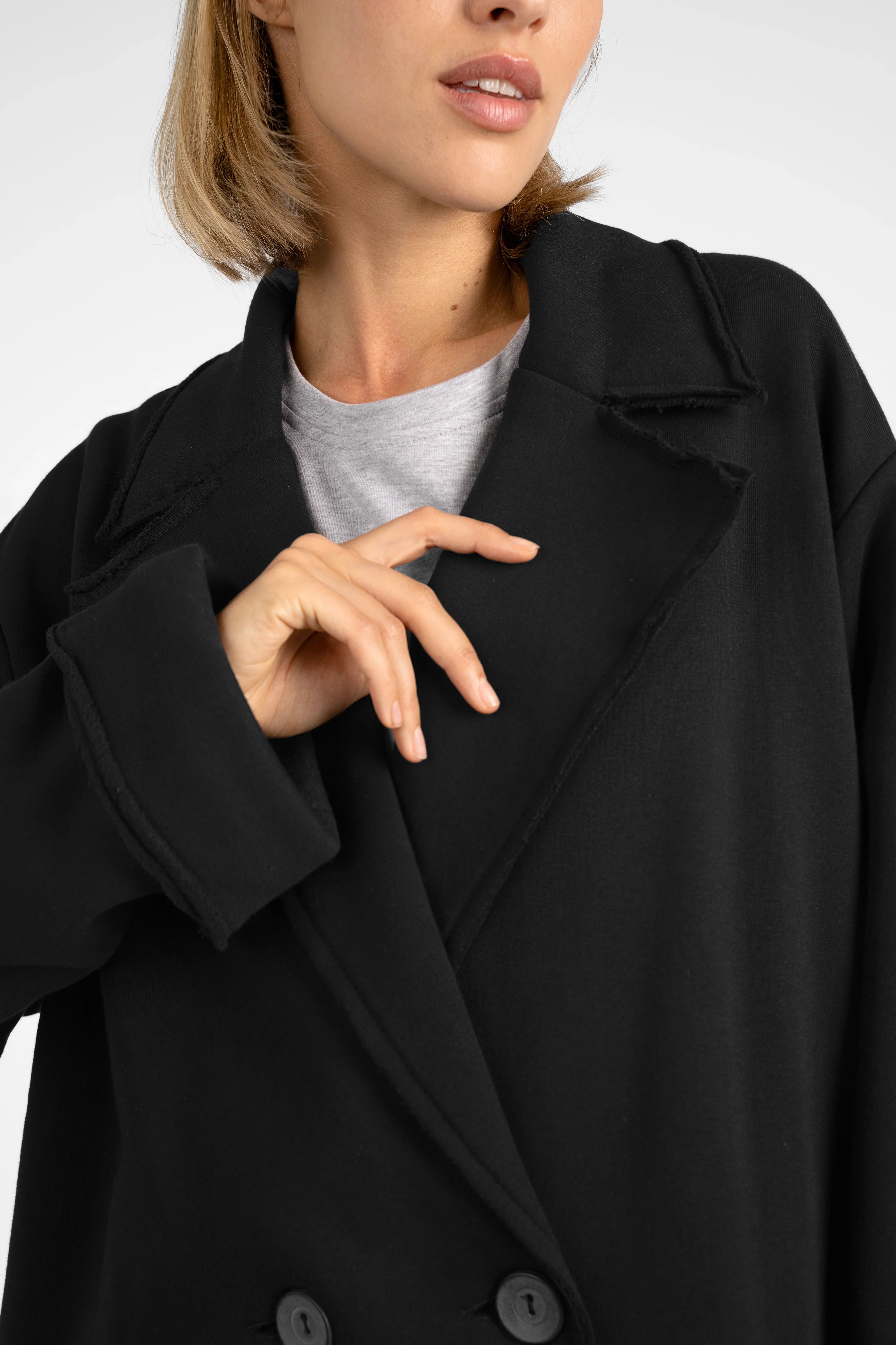 MONDY.K Oversize Sweatmantel black oversized jersey coat with lapel collar and large pockets