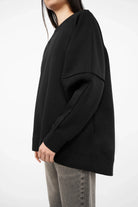 NAIRA Cozy Sweater black A-line soft brushed cotton relaxed fit with round neckline and raglan sleeves