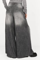 NEDY Wide Leg Hose in washed black with soft cotton fabric and extra-wide silhouette seen from the back