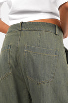 SAIKA Relaxed Tapered Hose in textured cotton with denim look and tea-dyed wash, relaxed fit with tapered leg and button zipper front closure