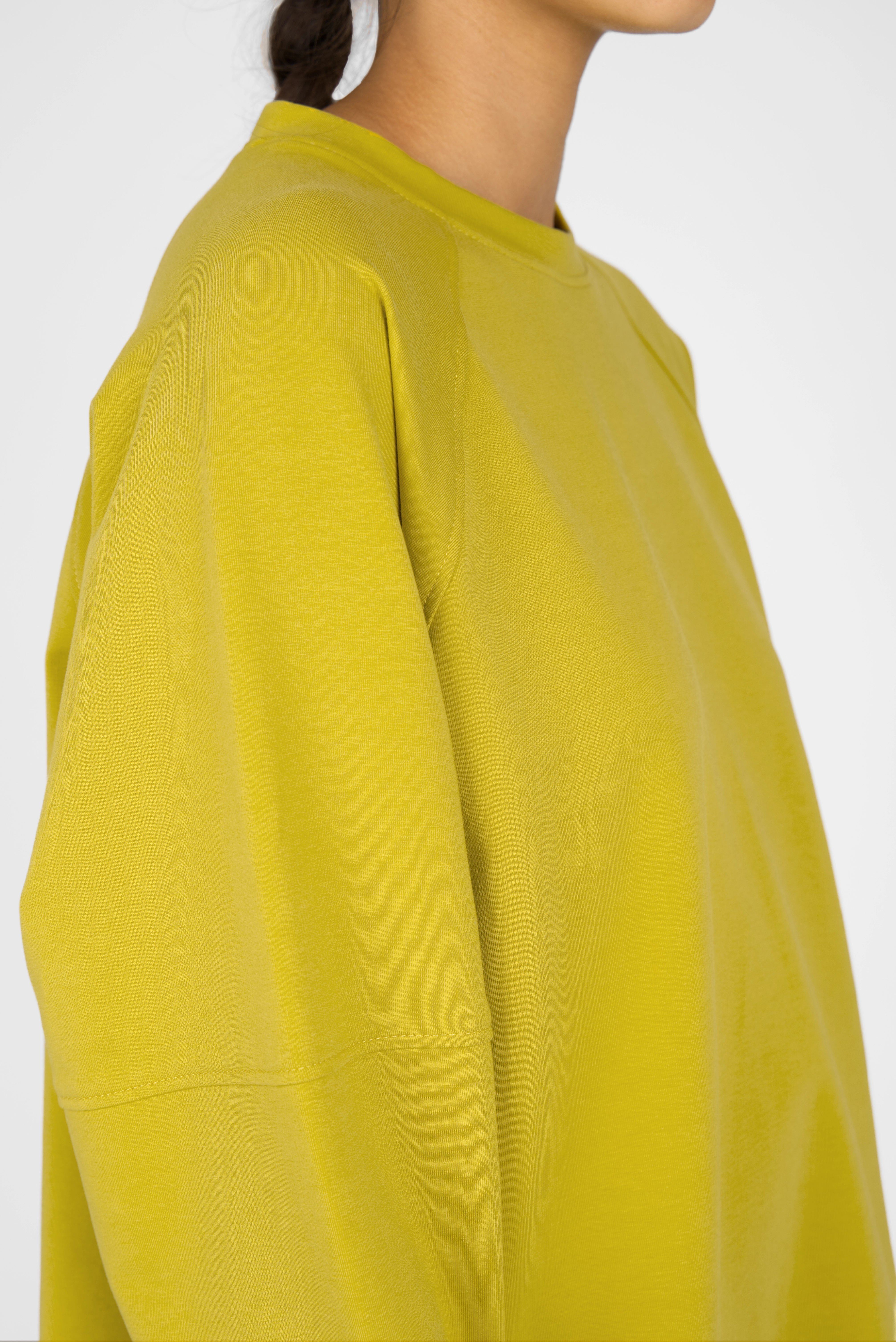 Yellow SELKA Sweater with A-line shape, raglan sleeves, and relaxed fit.