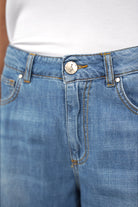 SYLA Wide Jeans faded mid-blue denim with tobacco contrast stitching and wide leg design