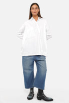 Oversized Hemdbluse aus Baumwoll-Mix mit asymmetrischer Knopfleiste und überschnittenen Schultern