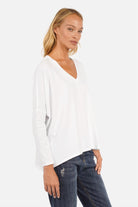 Blusenshirt Langarm aus hochwertiger Baumwolle mit V-Ausschnitt und weitem Relaxed Fit in offener Schnittkante
