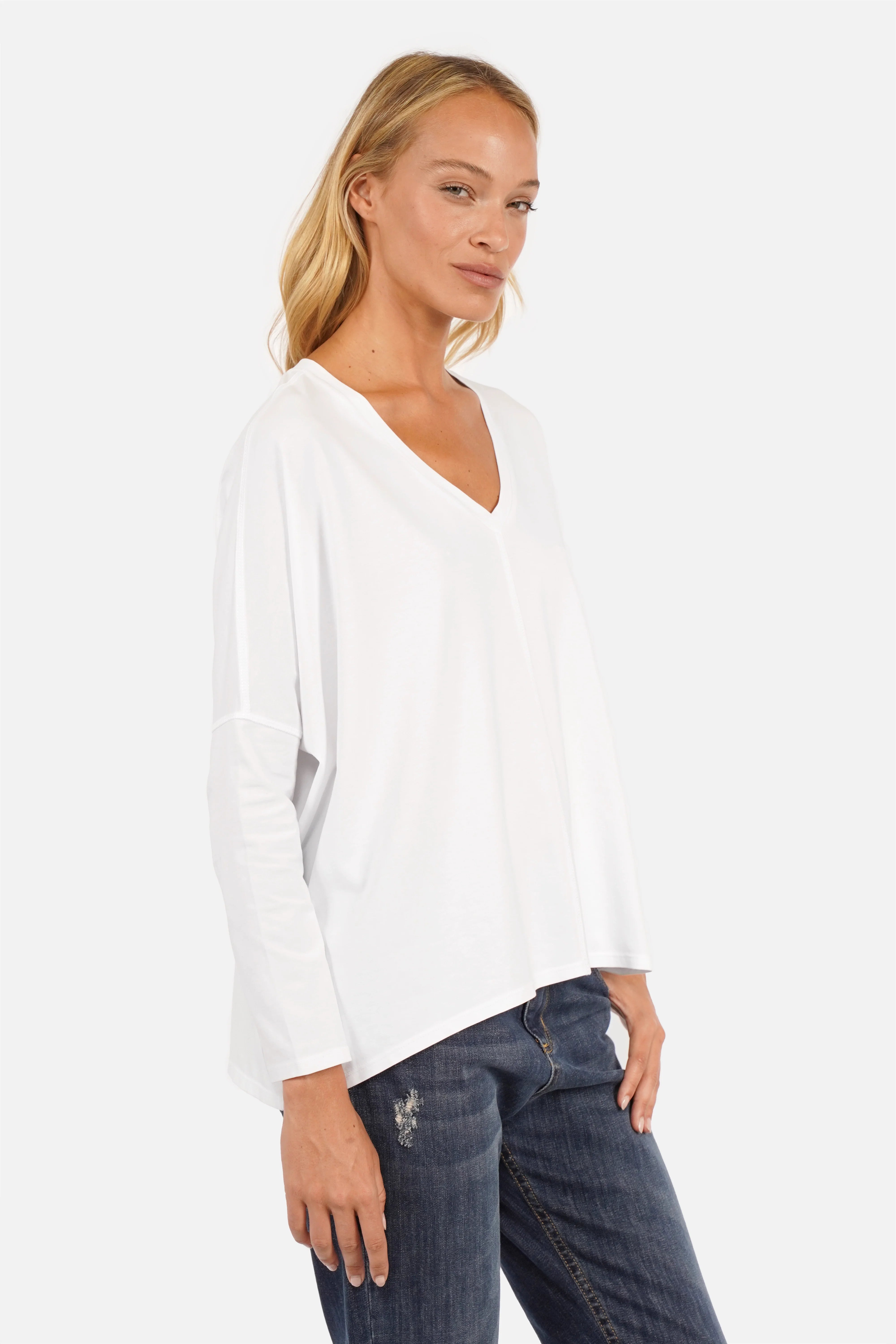 Blusenshirt Langarm aus hochwertiger Baumwolle mit V-Ausschnitt und weitem Relaxed Fit in offener Schnittkante