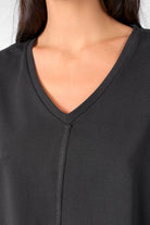 TIDA Blusenshirt black long sleeve V-neck relaxed fit with raw edge details