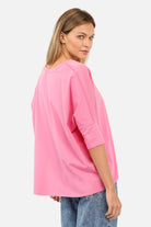 Blusenshirt mit V-Ausschnitt, lockerem Schnitt und abgerundetem Saum aus hochwertiger Baumwolle