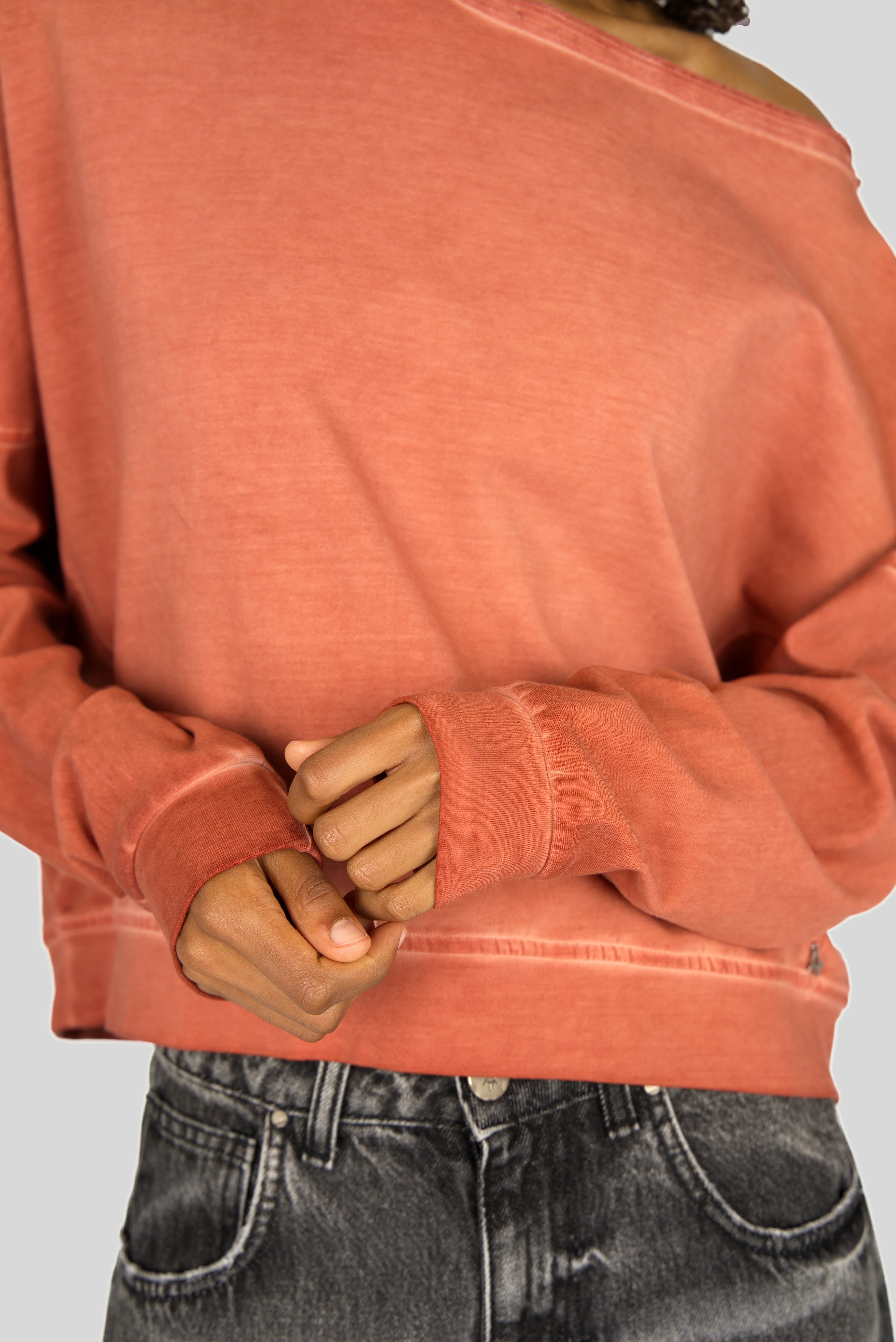 TIMAJ Revive One Shoulder Sweater in washed terracotta with loose fit and wide neckline showing one shoulder