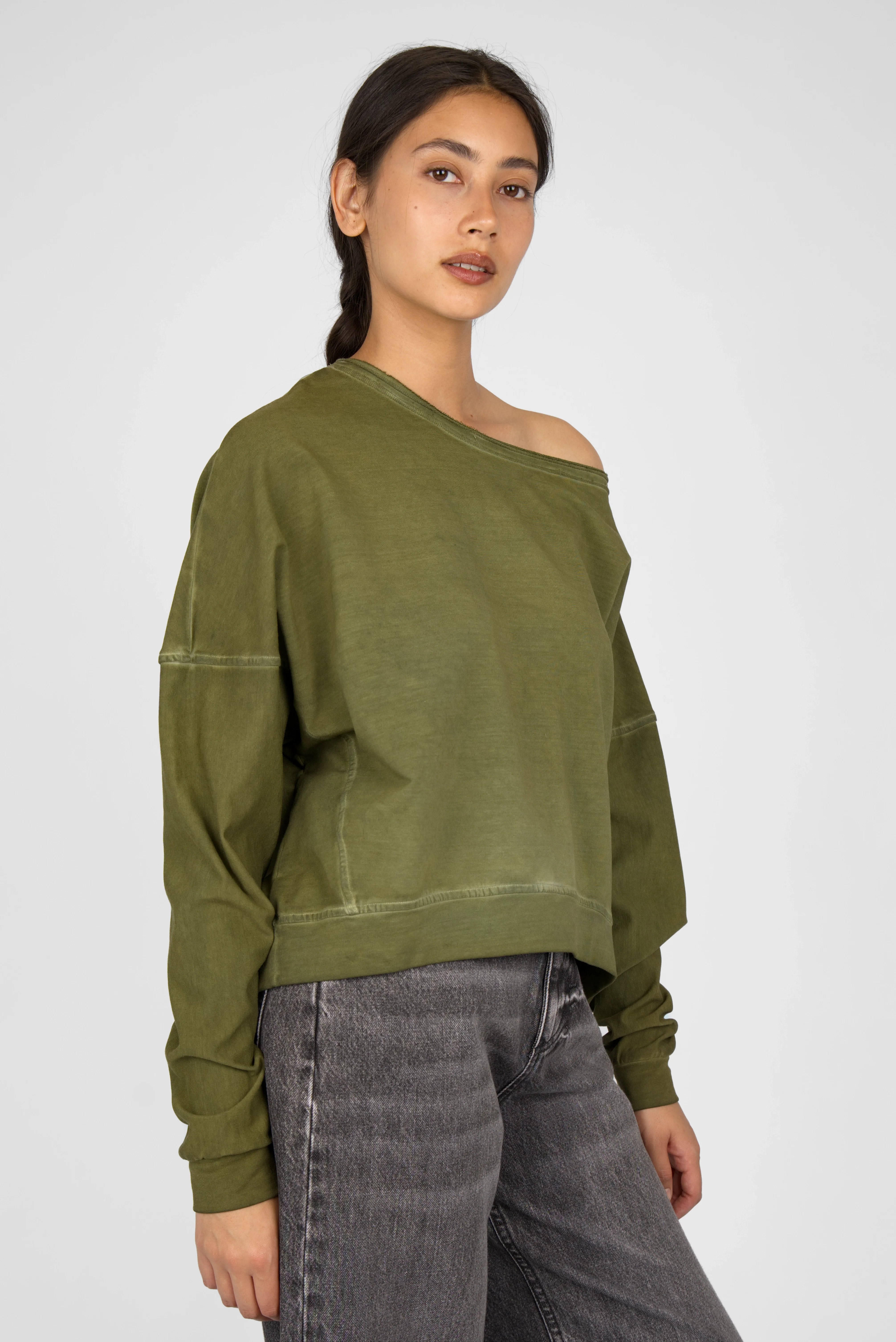 TIMAJ Revive One Shoulder Sweater in olive green with loose fit, wide neckline, and cold-wash finish.