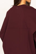 TOOVE Shirt in deep burgundy with relaxed fit and curved seam details